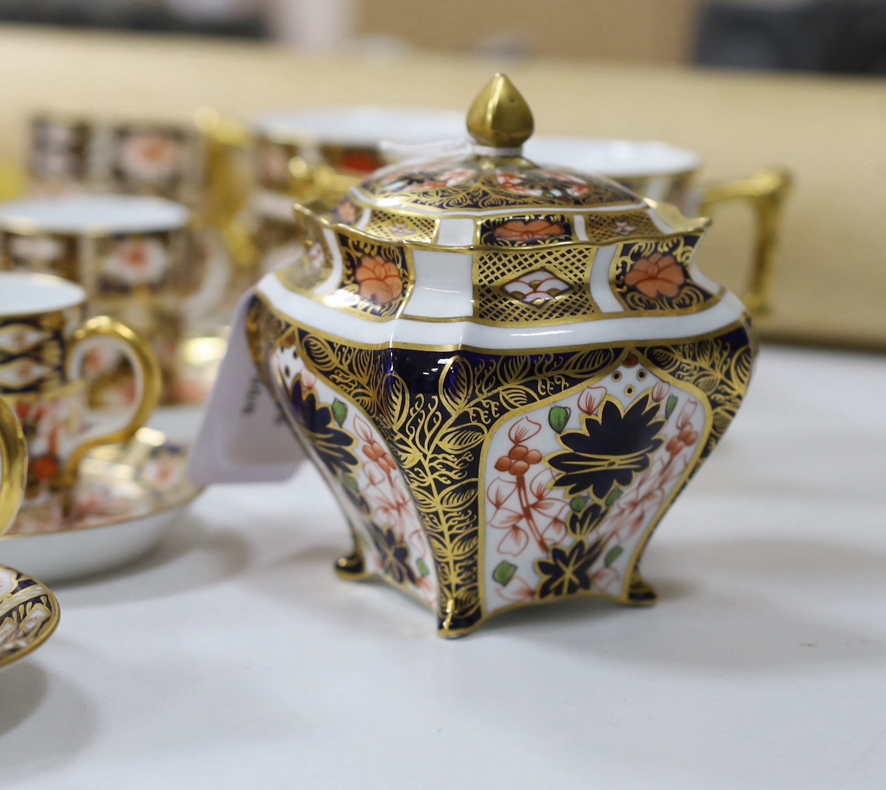 A collection of Royal Crown Derby Imari porcelain, largest 27cm in diameter